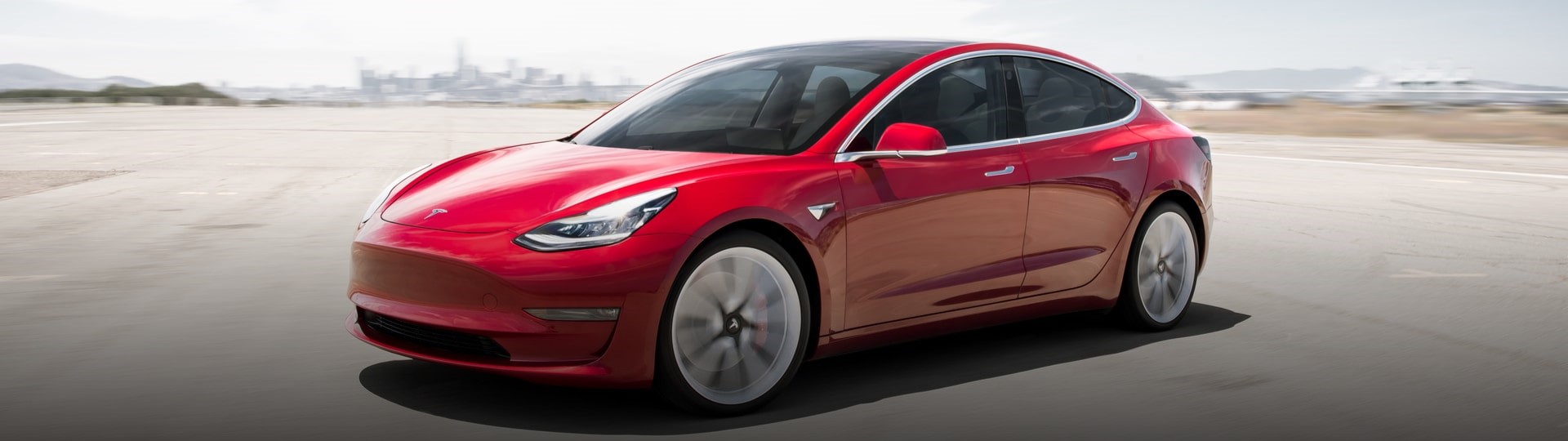 Čtvrtletní zisk automobilky Tesla poprvé překonal miliardu dolarů